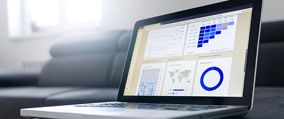 laptop with earnings reports